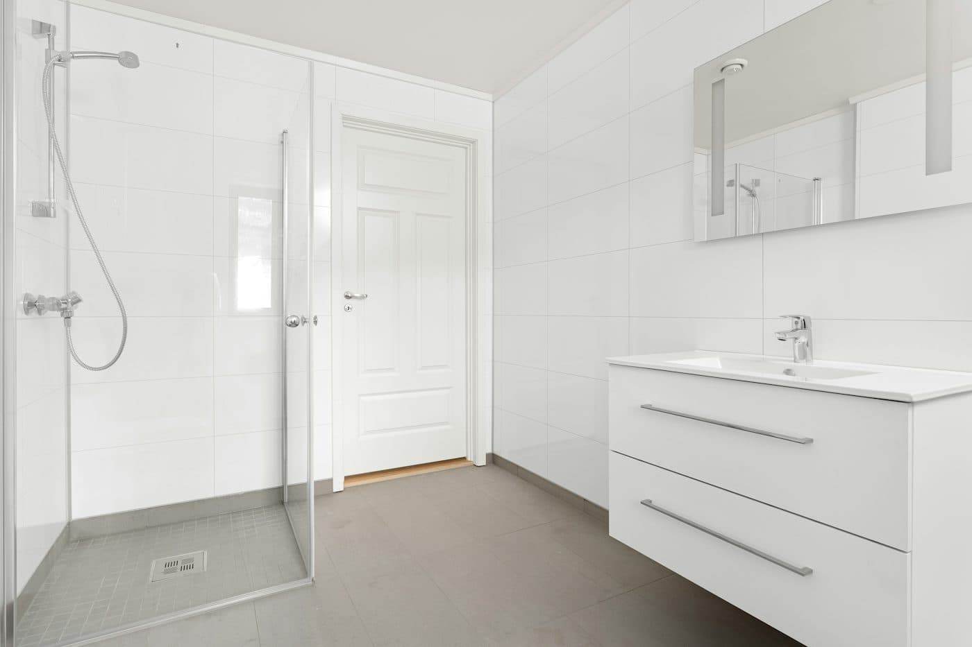 A clean, modern bathroom with a walk-in shower